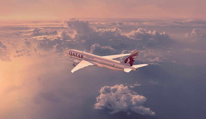 Qatar Airlines flight above the clouds